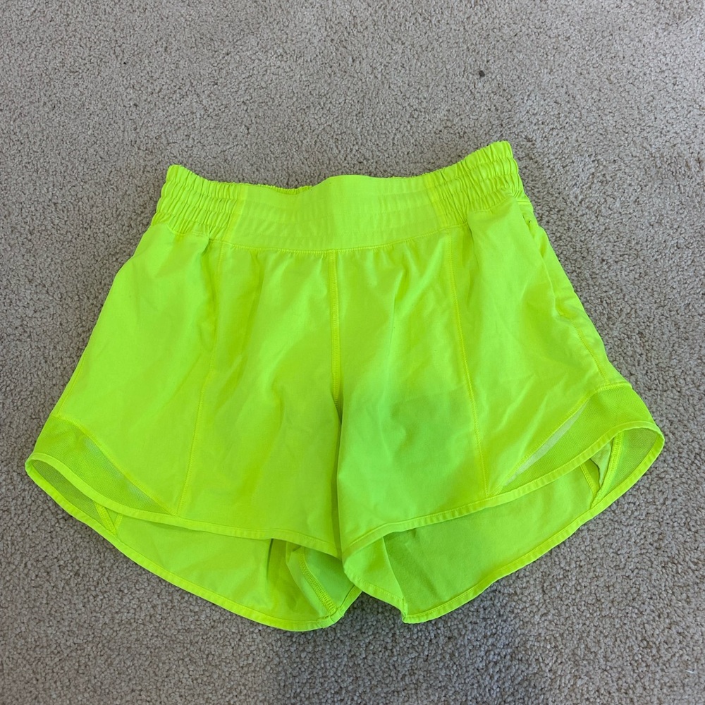 NWOT neon yellow lululemon shorts! 4 inch low rise!